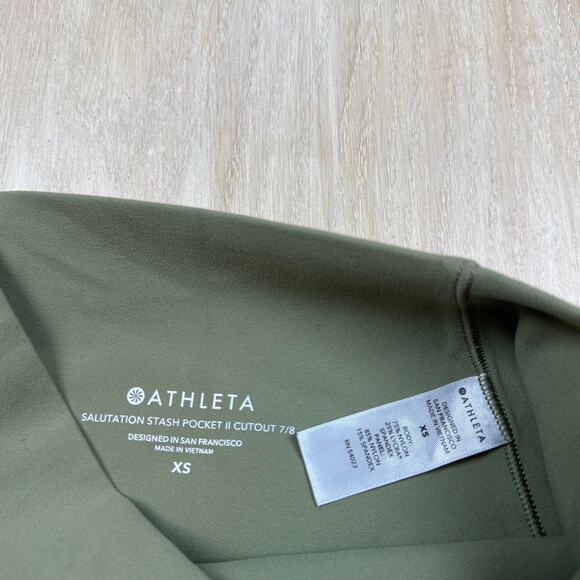 Athleta Salutation Stash Pocket II Laser Cut 7/8 Tight Olive Green Leggings XS - Picture 10 of 16